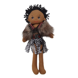 Korowai maori cloak worn by boy doll in New Zealand