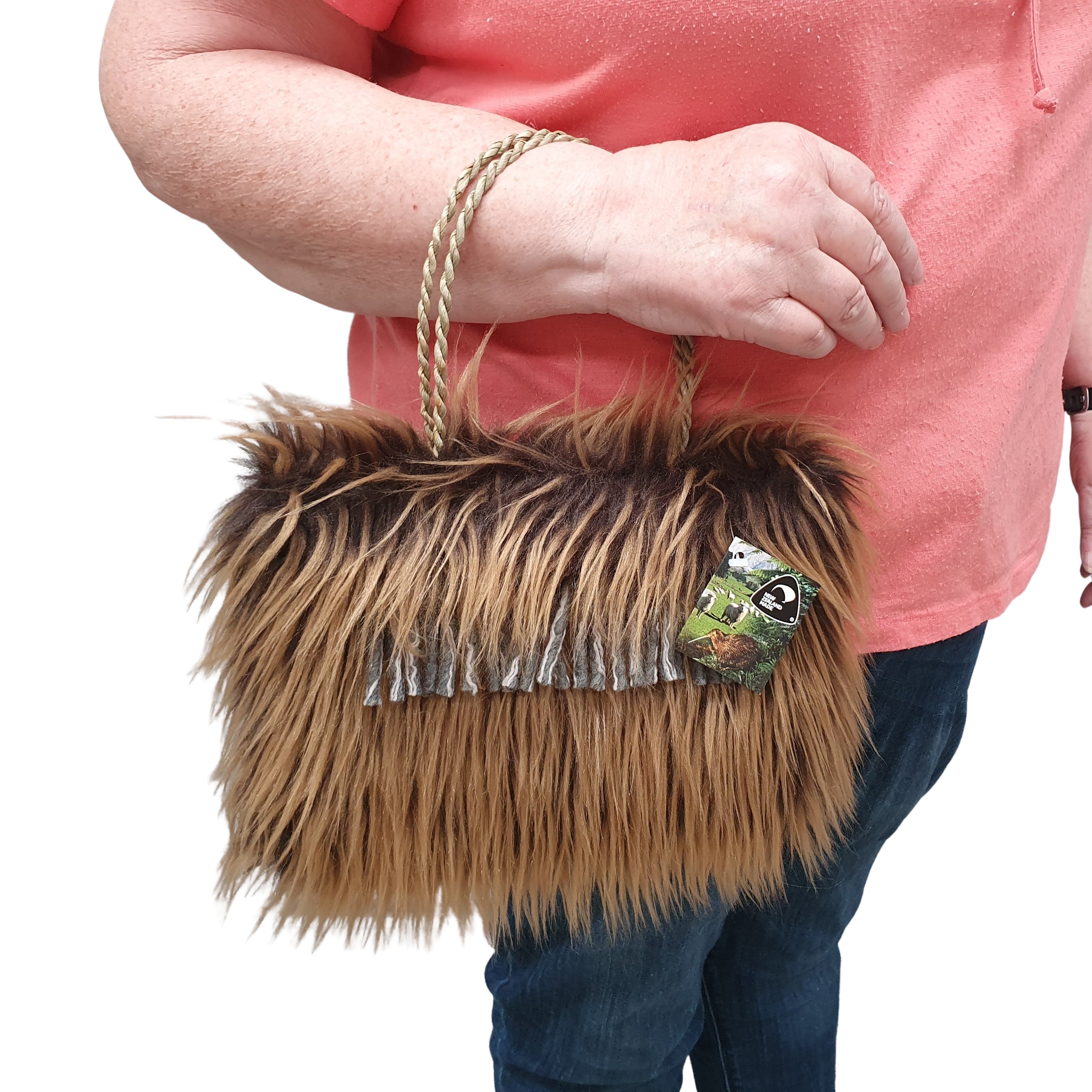 ROIMATA bag with wool tassles