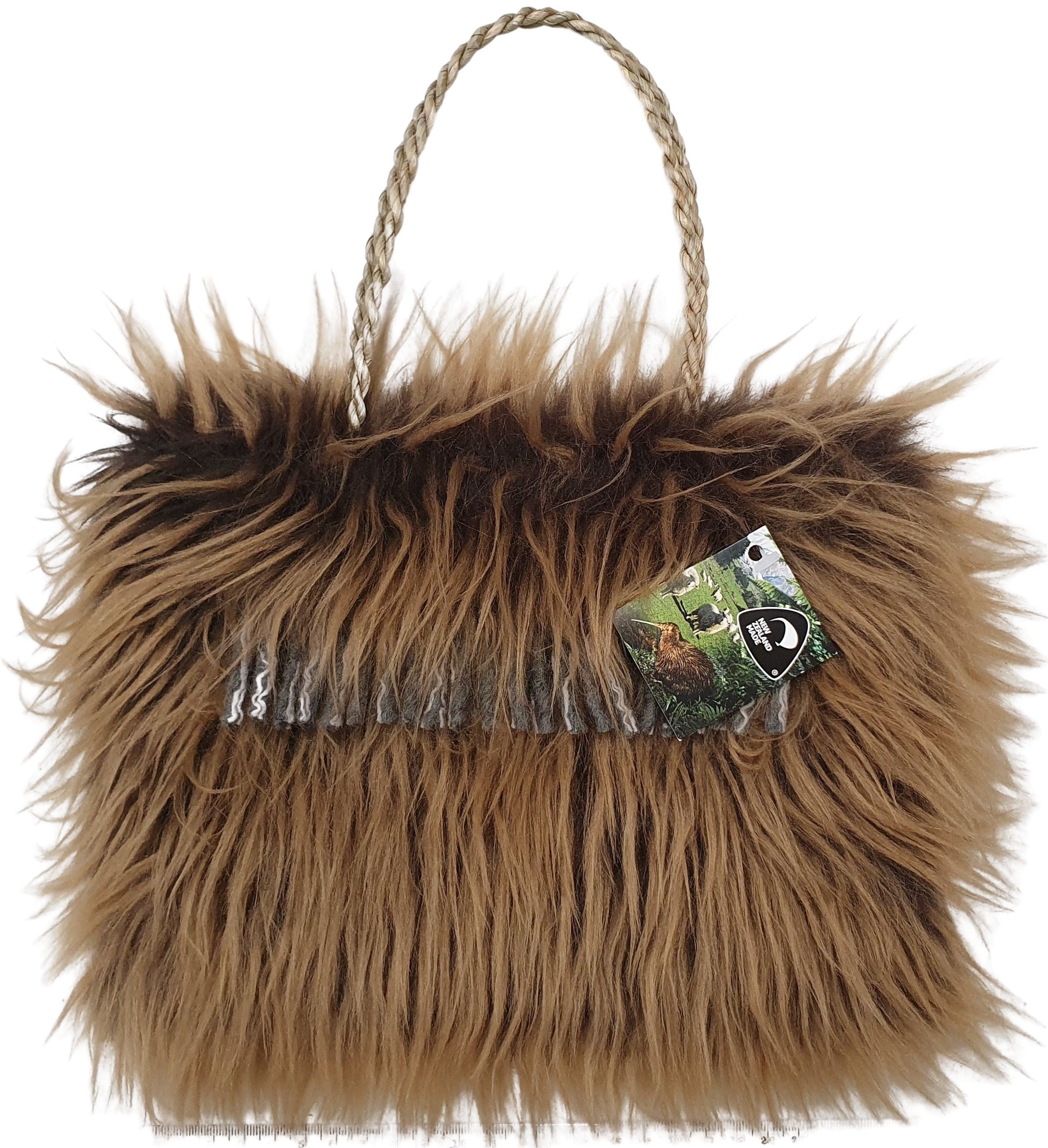 ROIMATA bag with wool tassles