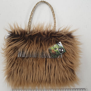 ROIMATA bag with wool tassles